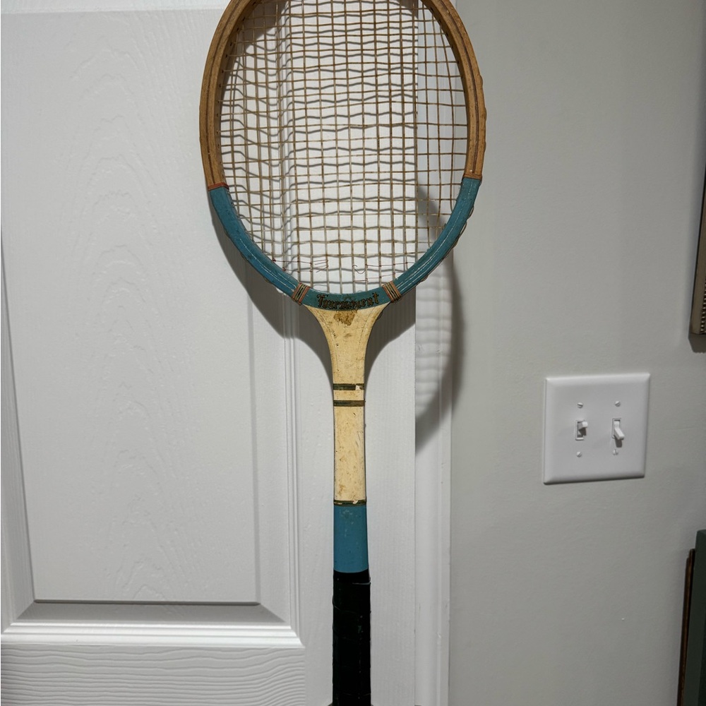 Vintage Tennis Racket with Blue and Black Accents